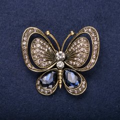 Брошка Метелик з синіми каменями 50х44мм жовтий метал купити біжутерію дешево в інтернеті