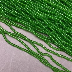 Намистини Чеський Кришталь на волосіні світло-зелене прозоре гранований рондель d-3х2,5мм + - L-36см + -