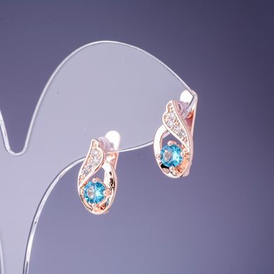Сережки з блакитними кристалами 16х7мм золотистий метал купити біжутерію дешево в інтернеті