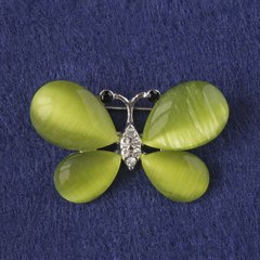 Брошка Метелик оливкове котяче око, білі стрази, сріблястий метал 25х38мм+- купити біжутерію дешево в