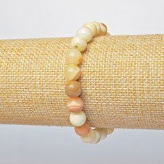 Браслет Агат жовтий прес. гладка кулька d-8,5мм + - L-18см + - стрейч