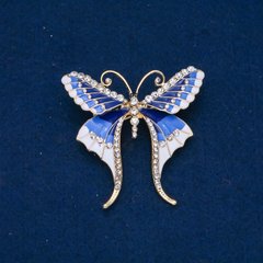 Брошка Метелик білі стрази, блакитна, синя і біла емаль, золотистий метал 48х50мм + - купити біжутерію дешево