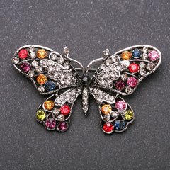 Брошка Метелик в різнокольорових стразах сірий метал 55х34мм купити біжутерію дешево в інтернеті