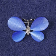 Брошка Метелик синє котяче око, білі стрази, сріблястий метал 25х38мм+- купити біжутерію дешево в інтернеті