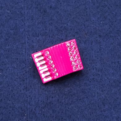 Брошка Акордеон зі стразами рожевий метал 24х17мм купити біжутерію дешево в інтернеті