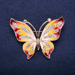 Брошка Метелик білі стрази червона, жовта емаль 42х56мм жовтий метал купити біжутерію дешево в інтернеті