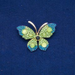Брошка Метелик золотистий метал, зелені і сині стрази, намистини 34х50мм + - купити біжутерію дешево в