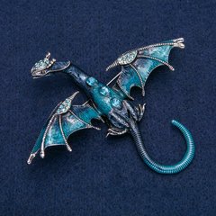 Брошка-кулон Дракон сріблястий метал з синьою емаллю і синіми і бензин стразами 90х78мм + - купити біжутерію