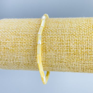 Браслет Перламутр тонований жовтий шайба d-4х2мм+- L-18см (стрейч) купити біжутерію дешево в інтернеті