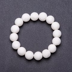 Браслет натуральний камінь на резинці губчастий білий Корал d- 12мм L-18см купити біжутерію дешево в інтернеті