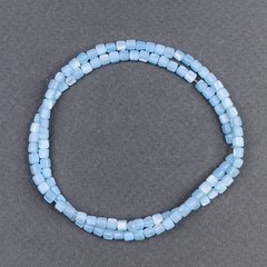 Намистини тонований Перламутр блакитний циліндр d-3,5х3,5мм+- L-40см+- на волосіні купити біжутерію дешево в