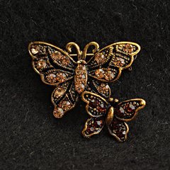 Брошка Метелики т .золотий метал і стрази 20х25мм + - купити біжутерію дешево в інтернеті