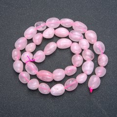 Намистини на нитці з натурального каменю Рожевий кварц кругла галтівка d-9х12мм L-40см + - купити біжутерію