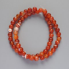 Намистини Агат помаранчевий натуральний камінь гладка кулька d-6мм+- L-38см + - на волосіні купити біжутерію