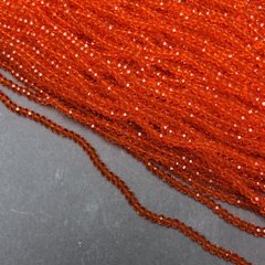 Намистини Чеський Кришталь на волосіні червоно-помаранчеве прозоре гранований рондель d-3х2,5мм + - L-36-38см