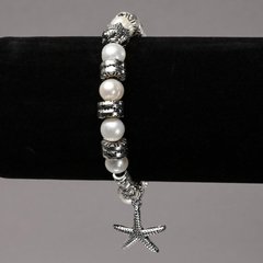 Браслет на резинці з Річкових перлів зі сріблястими вставками і підвісками d-8мм+- L-18см+- купити біжутерію