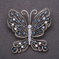 Брошка Метелик з синіми стразами 53х54мм сірий метал купити біжутерію дешево в інтернеті