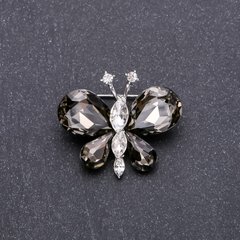 Брошка Метелик з сірими кристалами 36х30мм білий метал купити біжутерію дешево в інтернеті