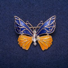 Брошка Метелик синьо-жовта емаль, білий кристал, золотистий метал 30х36мм купити біжутерію дешево в інтернеті